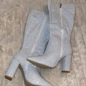 Brand new silver sparkly over the knee boots size US 7